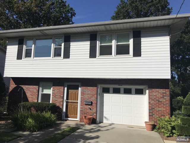 Immaculate home. Large eat-in-kitchen with new stove/oven, dishwasher and refrigerator. Bathroom with new vanity on 1st floor. Gleaming refinished hardwood floors on 1st floor. Master bedroom with 2 double closets, 2 additional BRs with double closets. Large family room, summer kitchen and full bath and washer/dryer on ground floor. Use of yard, close to school, NY bus. Tenant will have access to garage as of Jan 1, 2024. Tenant responsible for snow removal, landlord responsible for lawn maintenance.