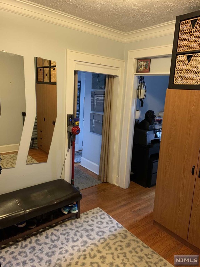 Updated 1 Bedroom Corner Unit Apartment w High Ceilings, Ample Size Rooms, Hardwood Floors and Plenty of Natural Light throughout. Close to Transportation, Shopping, Schools and House of Worship. This Quality 1 Bedroom Rental Wont Last!!! Coin Operated Washer & Dryer on premises.