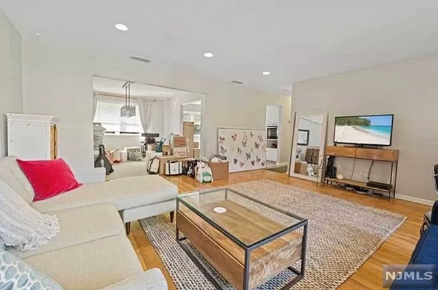 Welcome to your new home at 1515 10th Street, Apartment #2 in Fort Lee, NJ! Nestled on the top floor of a charming 2-family home on a quiet dead-end street, this 2-bedroom, 2-bathroom gem offers the perfect blend of comfort and convenience. Hardwood floors grace the entire apartment, complemented by a kitchen boasting new appliances. Both bathrooms have been fully renovated. Central A/C. Experience the luxury of your own in-unit washer and dryer, along with the perk of garage parking for one car + driveway parking for another. Commuting to NYC is a breeze with a bus stop just up the block, and quick access to major highways. Plus, enjoy a mere 2-minute stroll to a park equipped with playgrounds, tennis courts, basketball courts, pickleball courts, etc. Sorry, no pets allowed. Apartment will be fully cleaned, freshly painted, and ready for you to move in on April 1st!
