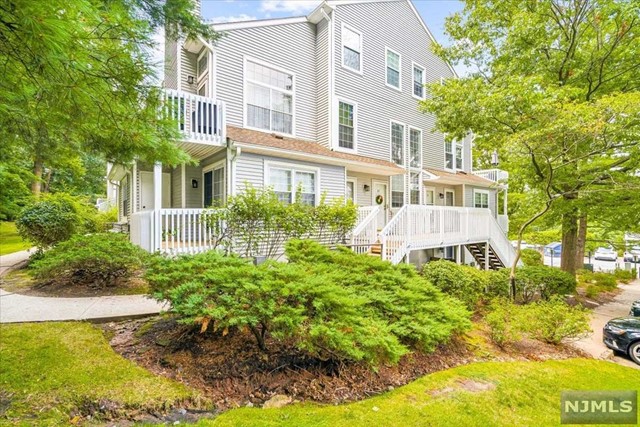 This home boasts two large bedrooms and two full baths. The kitchen has been fully renovated and features stainless steel appliances, a double sink, a double oven/range, granite countertops, and under-cabinet lighting. The master bedroom includes custom walk-in closets. Throughout the unit, there are double-pane windows, hardwood flooring, high-efficiency recessed LED lighting, and a fireplace. The lower level has been completely remodeled and includes a home theater, a large bar, a den/workout room, and an office. The development offers amenities such as a pool, tennis courts, basketball, security, and snow removal services. Conveniently located in the heart of Englewood, mins to NYC and bus stop right outside the community. NTN credit report required.