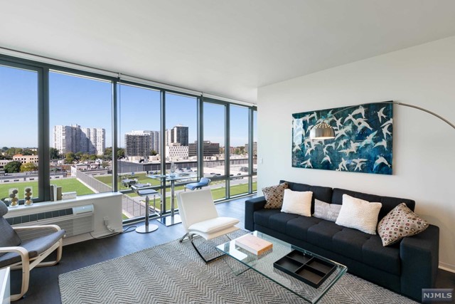 Live in the center of it all! Located in the heart of the New Downtown Fort Lee, this boutique building offers it all! Oversized one & two bedrooms, featuring hardwood floors, new kitchens and bathrooms, floor to ceiling windows, central air, in unit laundry and so much more! Each unit is professionally cleaned and painted prior to move in! We Even install the blinds for you! Building amenities include outdoor pool with huge outdoor grounds, Gym, resident lounge, kids play area. Parking garage available for additional fee. Pet friendly building! This full service building with 24 hours concierge offers a combination of luxury residence at great rents! Shuttle to NYC available daily, get your coffee and pastry across the street, catch a movie at the iPic across from the building, enjoy dinner or lunch at one of the next door restaurants, CVS is located at the corner, Liquor store, nail salon, CycleBar next door and the Fort Lee Park is right across the street.
