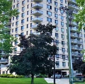 Enjoy luxury living at the Baridge House on prestigious Prospect Avenue! This sunny freshly painted unit faces East with a distant view of the GW bridge. Newer windows. Generous sized living room leading to outdoor terrace. Galley kitchen open to the dining area. Hall with 3 closets leads to bath with glass enclosed double size shower. Large bedroom with double closet, built-in shelves and desk/vanity. Move in and enjoy it as it is or make updates. Garage parking for 1 car G2-54. Outdoor pool, gym and 24 hr. doorperson. NYC bus just steps away! Nearby train station to Hoboken and PATH. Come and enjoy the shopping, restaurants and entertainment that the Hackensack redevelopment has to offer! Note - must be owner occupied for 1st 2 years before renting -possible short sale!