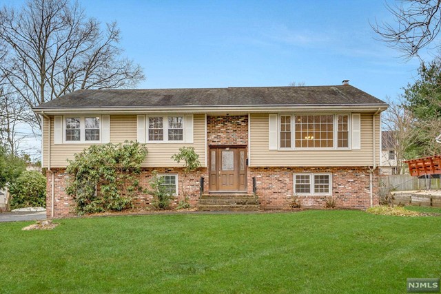 Newly renovated spacious and bright home in the heart of Demarest, conveniently located close to schools and NYC buses. The upper level features formal living room, formal dining room, modern kitchen w/ new appliances, beautiful sunroom (w/ gas fireplace) perfect for family gathering or just relaxing, master suite with full bath, two additional large-sized bedrooms and another full bath. The walkout lower level offers family room w/ fireplace, bedroom, full bath, laundry w/ new washer/dryer and two-car attached garage. Newly installed expansive wooden patio is perfect for outdoor entertaining and dining. Blue-Ribbon Award-winning School system! Landlord will pay for landscaping. Tenant Responsible for Snow Removal.
