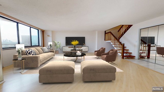 Freshly painted, 2 bdrms/2.5 baths duplex w/ 1853 Sq Ft of l/ space on the 17th floor w/ magnificent NYC SKYLINE views from both the terraces! Very bright, Upgraded kitchen w/ SS appliances, plenty of kitchen cabinets, opens up to the dining room w/ FIREPLACE, sliding glass door to terrace. Powder room on the main floor & 2 full baths Upstairs. Laminate wood floors throughout the first floor, Bamboo hardwood floors on the bedroom level! M/ bedroom suite, w/ a walk-in closet, Upgraded Master bath w/ jetted tub, double vanity, linen closet, Sauna (extra storage), His & Her closet & a private balcony. Very in demand model, Private & spacious bedrooms, abundant storage, a few steps away from the Elevator. Central heat & A/C, Washer dryer, & one indoor prkng. Harmon Cove Tower is an amenity rich complex incl 24 hr drmn/concierge, security, pool/kids pool, gym, steam room, basketball/tennis courts, Kids play room, Game room & play area etc. Easy commute to NYC, bust stop under the bldg