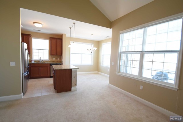 Welcome to the Grande Life! One of the larger units in the complex. 4th Floor penthouse available immediately. Featuring 2 bedrooms, 2 full bathrooms and large loft. Tremendous views throughout the unit. Unit includes large kitchen w/ granite center island, stainless steel appliances. Versatile loft may be used as an additional bedroom, office, or however your needs are best suited. In-unit, full sized laundry. Located across from the newer clubhouse. Amenities include two in-ground pools, two clubhouses with exercise rooms in each, billiards room, conference rooms, party rooms, tennis courts, and a basketball court. Assigned parking space in garage and additional parking outside. Near major highways, restaurants, shopping and much more! Required, lease application, credit report and score in the 700's, 1st month rent, 1 1/2 mth security and 1 month Realtor fee. NO PETS and NO SMOKING / VAPING in unit or balcony.