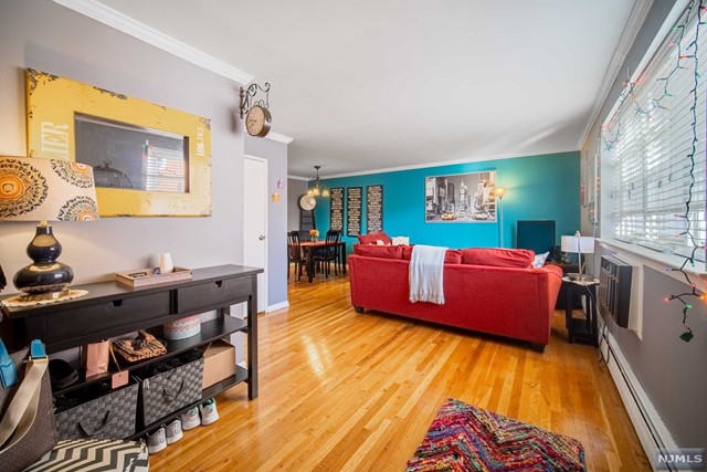Welcome home to this stunning and conveniently located 1 bedroom condo in West Orange! You'll be minutes away from downtown shops, restaurants, and public transportation. This beautiful unit comes with designated parking included and an abundance of beautifully maintained landscaping surrounding you. Enjoy hassle-free laundry thanks to the convenient in-building laundry room plus have extra storage space available in the basement. Best of all, your HOA fees cover heat, hot water, trash removal as well as taking care of snow removal and landscaping.