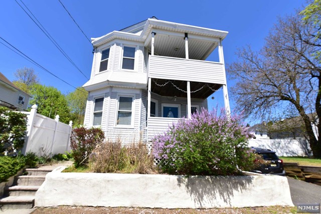 Light and Bright 2nd floor two bedroom apartment in very good condition. Freshly painted and carpets cleaned. Updated White Eat-In Kitchen w/tile floor (new refrigerator included), Rear porch great for pantry &/or storage. Three Multi split system air conditioners, gas hot water baseboard heat, ceiling fans, six panel raised doors, closets with wire shelving, window blinds. Updated Tile Bath. Rear staircase to yard and basement. Tenant has shared use of fenced-in yard with 1st floor tenant. Tenant has TWO off street parking spots. Tenant to have area in basement for storage and washer/dryer for their use. Tenant to pay for gas, heat and electric. Credit and eviction check through InsideCredit (not NTN) should have good credit. All adults to have credit and eviction check and to be on the lease. No Smoking in unit.