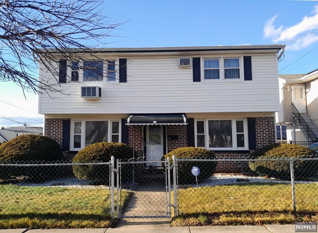 Beautiful 2 bedroom, 1.5 bath, newly renovated, move-in condition 1st fl. apartment in non-owner occupied home with full, finished basement which includes recreation area, half bath, laundry, storage and access to outside. New hardwood floors, new tiles in DR, Kit and bathrooms, new quartz counter-tops, new stove and microwave, completely renovated bathroom, new light fixtures and new basement flooring. Apartment offers 1 car garage, 1 driveway parking, exclusive use of fenced-in backyard, washer/dryer. NO PETS, NO SMOKING. Close to public transportation, easy commute to NYC, shops, schools, fitness centers and parks. Tenant pays all utilities except water. Minimum credit score of 700, proof of income and identity.