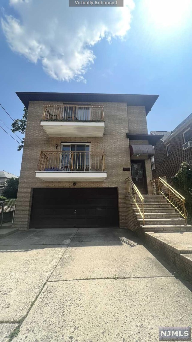 Newly renovated spacious 3 bedrooms, 2 bathrooms first-floor apartment in a 2-family house. The entire apartment is fully renovated, and freshly painted. Located in a great quiet neighborhood and on a dead-end street with no traffic flow. Very close to New York City and 5 minutes walk to public transportation. Next to middle school. - Washer and dryer in the unit. - New SS appliances and granite countertop in the kitchen. - Large shared backyard and balcony for the tenant's use. - Central air-conditioning and baseboard heating with Google Nest control. - Total 2 car parking spaces, 1 in garage, 1 outside, - Extra storage spaces in the garage. - Landlord pays for water and electricity, tenants pay for gas. - No smoking. - Small dogs are allowed with an additional fee. THE LISTING AGENT IS ONE OF THE LANDLORDS.