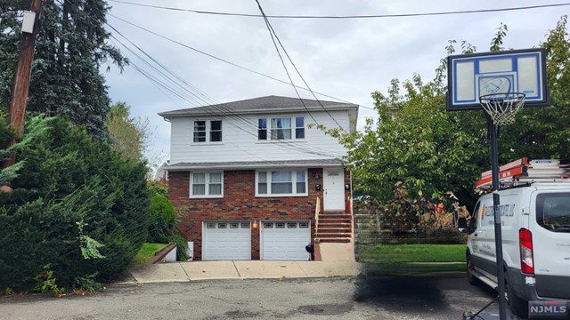 Lovely, bright, spacious 3 bedroom apartment on a quiet cul-de-sac. Hardwood flooring throughout (except kitchen & bath.) Large eat in kitchen, dining room, large living room, and use of 1 garage and 1/2 of driveway. Plenty of on street parking in this quiet neighborhood. Shared laundry on lower level. Close to public transportation and shopping. Use of backyard and shed. Tenant responsible for 40% of monthly gas/electric bill, yard maintenance and snow removal. Water included in rent.