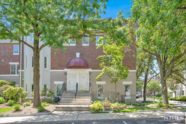 This beautiful townhome boasts 1,545 Square ft of luxurious living. Upon entry, marvel at your large, renovated kitchen equipped with custom wood cabinetry, stainless steel appliances and a massive peninsula island. Spacious dining and living area complete with bay windows and central heat/ac make this the perfect space for relaxing and entertaining. Upstairs you'll find the primary bedroom complete with a large walk-in closet and spa-like bathroom with porcelain tiles and jetted tub. The second floor also features a 2nd bedroom, full bath and laundry. The ground floor provides an additional bedroom and FULL bath! Low monthly HOA fee. Common amenities include a beautifully landscaped patio area with cobblestone walk-ways, picnic benches, bbq area, and play area. One on-site assigned parking space is included, plus plenty of visitor parking spaces for guests. Schools, restaurants, shopping, and transportation all within 3 block radius.