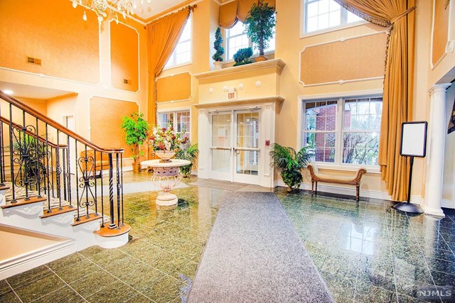 Luxurious Washington Grand, 55+ Gated Community! Best location in the Town. Sensational Large END UNIT on 2nd Level. Elegant Spacious One-Floor Living, Private End-Unit With Terrace. Huge Living Room and DR featuring Crown Molding and Large Windows. Master Bedroom suite W/"his-and-her" closets and MBath with Walk-in Shower and Double Sinks. 2nd Bedroom is off Entry Hall, along with another Full Bath & a Large Laundry Room. Office/Possible 3rd Bedroom with Sliders to a lovely Outdoor Balcony. Building is secure requiring code entry. One car deeded space. Amenities incl. Sitting Parlor with Fireplace, Mail Room and Outdoor Pool with Hot Tub Area. Library, Card Room, Craft Area and Ballroom for private parties.