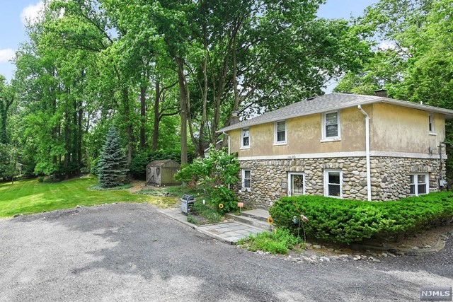 Charming private fieldstone cottage on large property. Entry foyer, living room, updated eat-in kitchen, Bedroom, office/nursery or walk-in closet, and bath. Parking for two cars, storage and washer/dryer hookup in basement of main house (across the driveway), tenant pays all utilities.