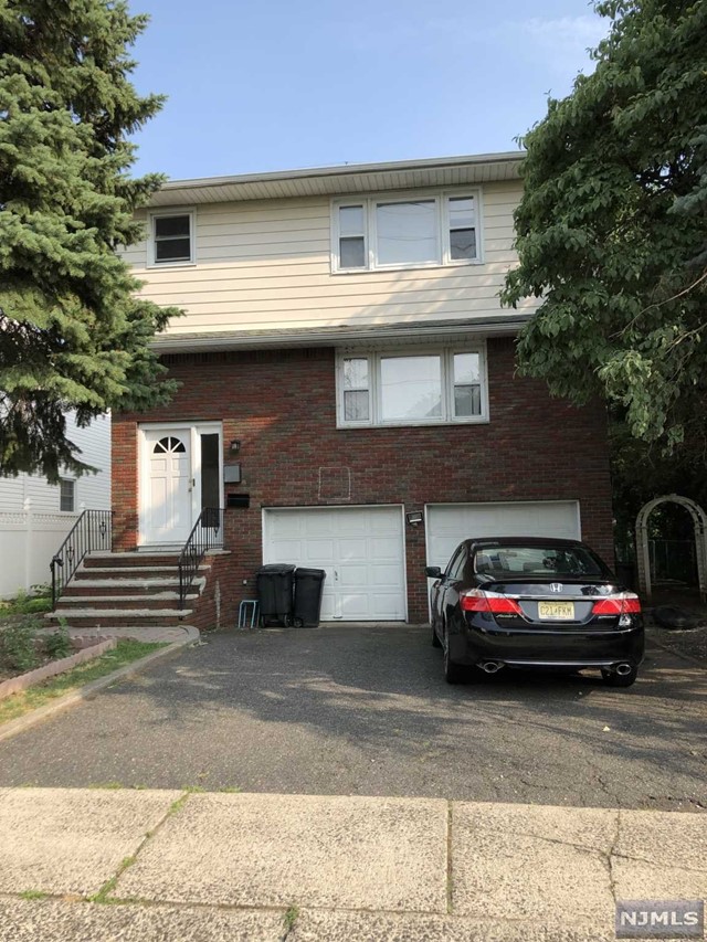 Beautiful updated first floor apartment located in a quite street close to schools and shopping. Hardwood floor throughout . New kitchen with quartz counter top and stainless steel appliances . New bathroom. Other amenities include laundry facilities, one car garage, driveway and use of backyard.