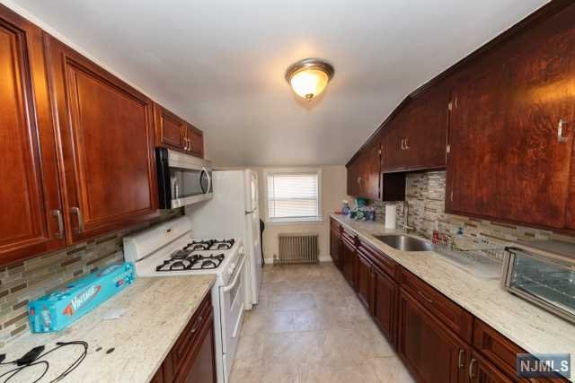 ALL UTILITIES INCLUDED!!! Don't miss out on your opportunity to live in a thriving up and coming section of Bloomfield at a reasonable price that won't crush your pockets like some neighboring towns. With direct access to NYC Transportation via 3 midtown direct options nearby, as well as multiple Downtowns to choose from you will still have city access with the quiet feel of a suburb far from the city. Minutes from Downtown Montclair, Bloomfield Center, Downtown Nutley, Downtown Newark, Penn Station, The Prudential Center, the Parkway, Rt 3, Clifton Commons, the American Dream, the brand New Hackensack Meridian School of Medicine Campus, and so much more you will always have something to do with numerous restaurants and festivities to choose from close to your home and job! You can go anywhere anytime you want with ease from Down the Shore to NYC via Train or the Lincoln Tunnel. Don't miss out on this rare opportunity to live in the middle of it all at a reasonable price.