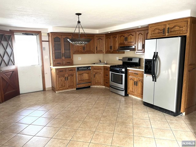 1st Floor, 3 Bedrooms, 2 Full Bath Apartment in a 2 family house, Hardwood Floors, Central Air, Baseboard Gas Heat, Large Kitchen with Ceramic Tiles, Refrigerator, Dishwasher and Sliding Doors to the Deck, Master Bedroom with Full Bath and walk in closet, Basement with Washer/Dryer and Storage, includes one off Street Parking, House will be freshly painted in neutral colors