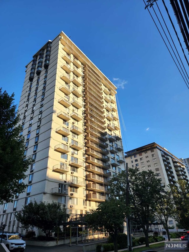 What a view! This spacious and modern partly furnished 2-bedroom, 2-bathroom corner rental unit is just a block away from Hackensack Hospital and close to NYC Express bus stop. The unit features a spacious, open living space for entertaining, with a private balcony offering a spectacular view of the New York City skyline. Renovated kitchen, two large bedrooms with walk-in closets. The building offers 24-hour doorman, 1 assigned parking space, laundry on floor, well-equipped gym, and outdoor heated pool. All utilities included with rent, only pay cable/WiFi. This a no pet building. 1-year minimum lease term required.