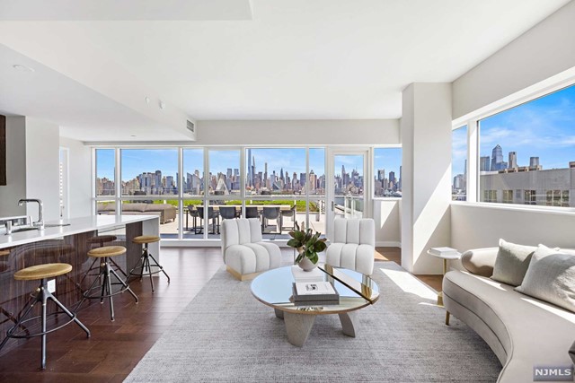 AVORA - Welcome to Penthouse 1102. Be the first to live in this extraordinary new duplex condominium with 2586-sf, private rooftop terrace and spectacular river & city views. This dramatic top-of-the-world residence has multiple outdoor spaces plus amazing interior space on two levels connected by a glass rail staircase. Distinctive finishes include beautiful wood floors, porcelain waterfall counters, contemporary cabinetry, exquisite quartz tile, high-end stainless steel appliances and custom selected hardware & fittings. Building amenities include 24-hour concierge service, health club, media room, sports simulator, resident lounges and the amazing 3rd floor pool deck & barbecue patio. Avora residents enjoy NY Waterway Ferry service, Hudson/Bergen Light Rail & NJ Transit Bus service literally steps from the lobby door. Come experience living here!