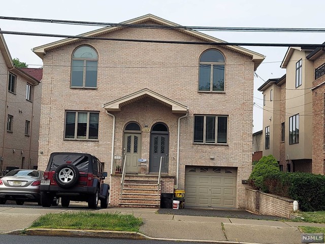 WELL MAINTAINED, FEATURING NEWER A/C AND HEATING SYSTEM, NEW PAINT, NEW WINDOW TREATMENTS, BRIGHT LIVING ROOM AND DINING AREA, STAINLESS STEEL APPLIANCES AND GRANITE COUNTERTOP. HARDWOOD FLOORS THROUGH OUT. GROUND NEWLY RENOVATED FLOOR AND FULL BATHROOM WITH SEPARATE ENTRANCE. CLOSE TO PUBLIC TRANSPORTATION, SHOPS AND RESTAURANTS.