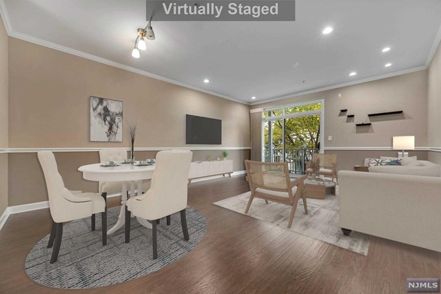 Welcome to this 3 Bedroom Beautiful updated Fanwood style Townhome in the sought after River front Community at Bulls Ferry Jacob Ferry. Flooded with natural sunlight and views of the New York City from multiple levels Main level has a remodeled kitchen with ss appliances and Quartz Countertops. Walk out patio on all floors! 3 ample sized bedrooms. Master Bedroom with walk in closet with custom made shelving. Fully renovated Master Bath is an OASIS and a MUST SEE!! Granite countertops with new porcelain sinks. Standing shower with a 8 jet, rainfall panel system. Top floor with open space perfect for a Mancave, work from home Office or kids play section. Smart technology throughout with 3 zones of heating/cooling ALL controlled with Nest thermostat. Ring Doorbell. The community features 24 Security, 2 pools, kids playground, picturesque views of Manhattan, Boardwalk, fine dining, free bus shuttle to NY Waterway Ferry, minutes to Manhattan, and shopping within minutes!