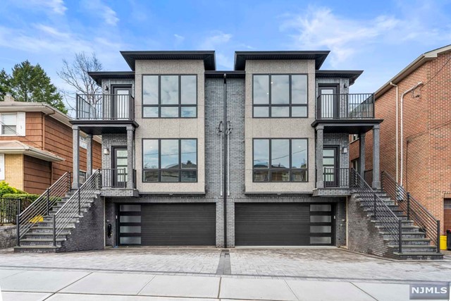 Welcome to luxury brand NEW DUPLEX! Oversized brick facade duplex conveniently located just steps away from Broad Avenue close to shops, restaurants and NYC transportation. Home offers 5 Bedrooms 3.5 Baths, Main level with 9FT Ceilings, Living Room, Den/Office, Dining Room, Modern Eat In Kitchen with quartz oversized Island and shaker Cabinets, top of the line Stainless Steel Appliances, Sliding Glass Door to Deck. Second Floor features Master Suite with SPA like Master Bath, 3 Additional Bedrooms with a full hallway Bath and Laundry. Ground Floor complete with a Recreation Room, Bedroom/Office, Full Bath, Garage and a separate side entrance.