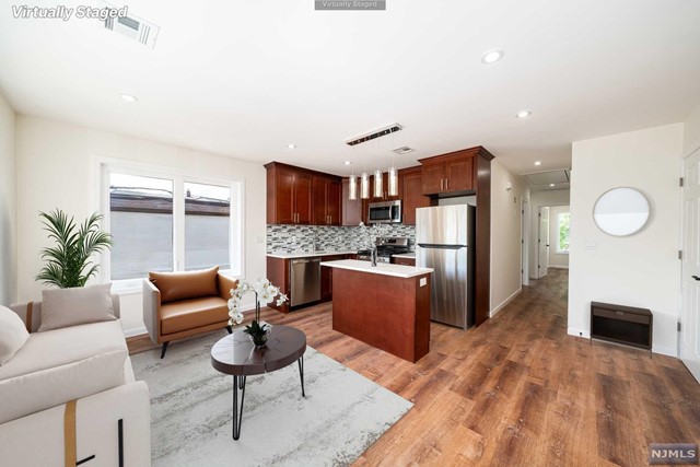 This three bedroom rental in Wallington has been completely rebuilt from the ground up. Enjoy the brand new kitchen with new appliances, new full bathrooms, and beautiful finishes throughout. This home also includes everything you need from central air conditioning, in-unit washer and dryer, AND parking, making this an unmissable opportunity in Bergen County.