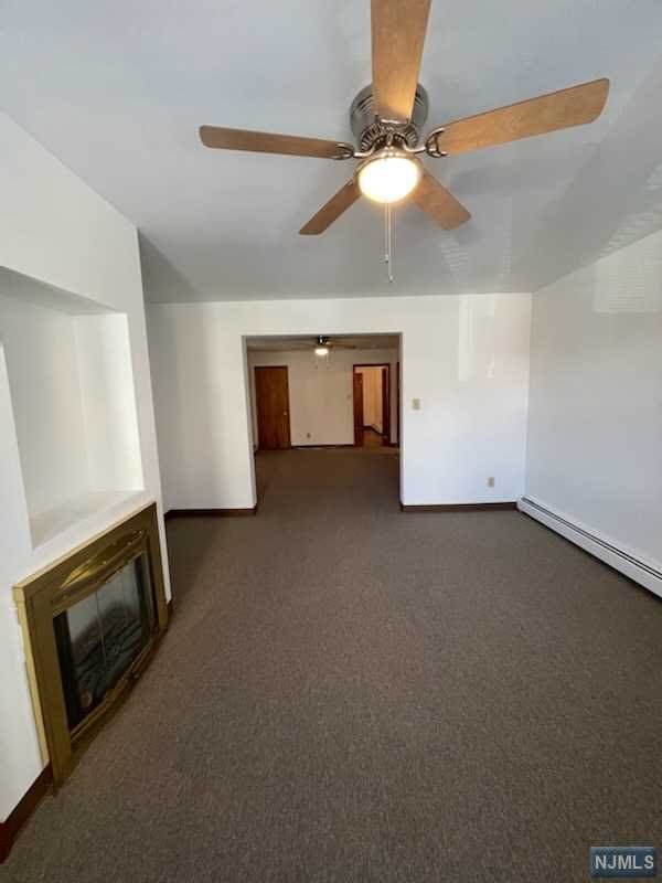 Welcome to our charming 2-bedroom apartment, located just moments away from NYC transportation and the Path station. This freshly painted unit is ready for new tenants to make it their own. Situated on the second floor, this apartment features a spacious living room, dining room, and an eat-in kitchen, perfect for preparing and enjoying meals with family or friends. The kitchen appliances are provided, and a laundry area is available for your convenience. The apartment also includes 2 bedrooms, providing ample space for a small family or roommates. A full bathroom is located nearby for easy access. Additionally, there is a small storage area within the unit to help you keep things organized. All utilities, except for water, are separate and will be the responsibility of the tenant. The owner will provide water as a courtesyand enjoy all that the surrounding area has to offer. Contact us today to schedule a showing!