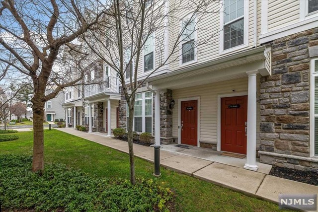 Welcome to Signature Place at Garfield. This Granville model townhouse is one of the largest in the complex boasting approx. 2015 sq. ft. of living space. The 1st floor open layout makes this townhouse feel even more spacious. Granite countertops and an abundance of cabinets are only a couple of features that make this kitchen special. Hardwood floors in the living and dining areas only add to the elegance. Imagine enjoying your favorite beverage while lounging on the cozy balcony. On the 2nd floor you'll be delighted to find 2 huge bedrooms along with a massive bonus room that can be used as a living area, playroom, office, or bedroom. You'll love the comforts of the master bedroom featuring an ensuite bathroom, huge WIC, and vaulted ceiling. Signature Place offers a clubhouse with lounge area, meeting room, prep kitchen, exercise room, WiFi and pool table. During the summer months, enjoy the complex pool. You'll love living here!