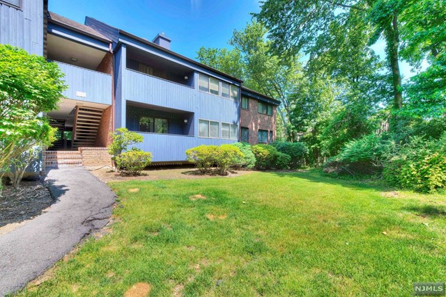 Welcome to this beautifully updated two bedroom, two bath condo located in desirable Indian Ridge Complex. two private covered decks facing the woods. Open floor plan offers large living room, dining room with sliding door to the deck.Renovated kitchen with quartz counters and brand new stainless steel appliances. Master bedroom with newer bathroom and walk-in closet. New HVAC, ,recess lighting, new floors and laundry in the unit, storage room, oversized garage and more... Outdoor in-ground pool, close to shops and public transportation.