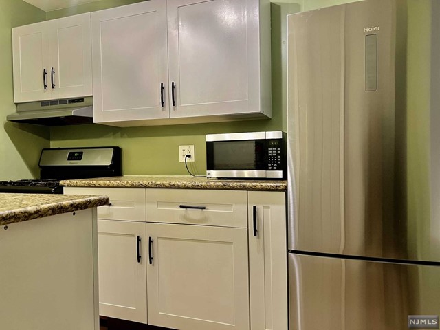 Bright and sunny 2 bdr, 1 bath condo with a very unique layout. A true commuter's dream - express bus to New York City right outside the door and free ferry shuttle! Separate eat in kitchen with stainless steel appliances Hardwood floors throughout, laundry room on premises and easy access to NJ transit and Jitney buses. Heat, hot/cold water and sewer bill included in rent. Property is ready for an immediate occupancy. Walking distance to Restaurants, Bars, Port Imperial and Shopping. Street parking. Pets are welcome 2nd floor, no elevator building. Perfect layout for roommates