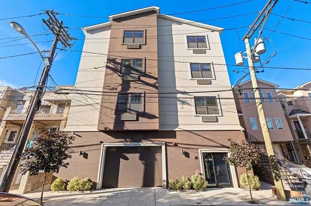 This luxury elevator building 1-bed 1-bath apartment rental offers an open-concept layout with a spacious Primary bedroom with featuring dual closets. The designer kitchen boasts granite countertops and stainless-steel appliances. Some additional key features include hardwood floors, ceramic bathroom tiles, and 1 private garage parking spot included. Amenities include on-floor washer/dryer access. Conveniently located near shops, restaurants, and transportation for an easy commute to NYC. Pet-friendly with a weight limit of 25lbs and a $200 non-refundable fee. Tenant responsible for electric, water, sewer, and 1- Month broker fee. Proof of income and credit check required.