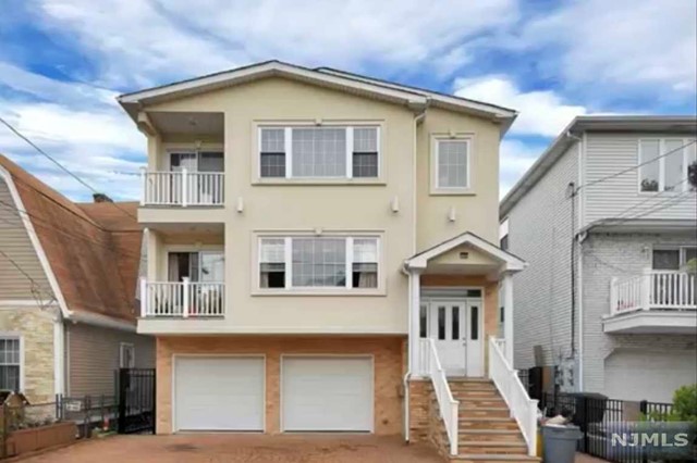 Gorgeous Modern 2 Family 2ND FL UNIT Built 2009 with One parking space & Garege space and huge rear outdoor patio area. Master Bed & Master Bath with a Private balcony, nice size 2 Bedrooms and a full bath. Upgraded Kitchen and Bright Living room with a terrace having a NYC VIEW. W/D IN UNIT. Minutes from the public transportation and beautiful Hudson Park area. Close to Bergenline ave for shopping and great places to eat. NYC BUS.