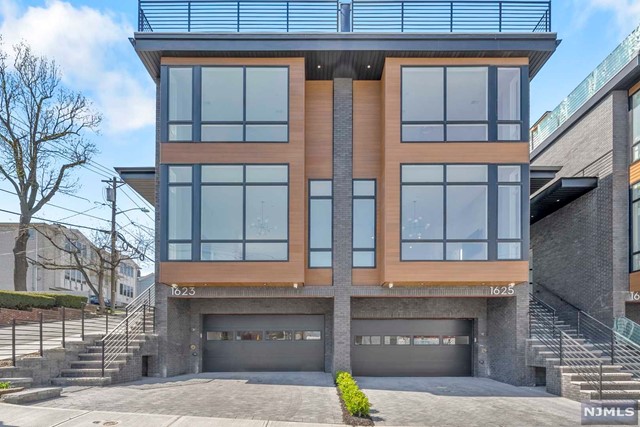 Designed & Built by SILVERLINE - Brand New Modern 3500+ SQFT Townhome on a Quiet Street. Open Concept Layout w/ Large Pella Windows & Custom Wide Plank European White Oak Flooring. Main Floor Features Oversized Ceilings, Tall Wood Doors + Living Room w/ Sleek Linear Fireplace, Dining Room, Entertainment Area, Walk Out Backyard. Additional Features Include- Large Chefs Kitchen Built w/ Modern European Cabinets, Sleek Floating Countertops, Large Kitchen Sink, Paneled Fridge& Freezer, Wine Cooler, Overwhelmingly Large Kitchen Island. Top Floor Boasts 3 Large Beds & 2 Full Baths - Master Bed w/ Spa Like M.Bath w/ Heated Floors, Large Freestanding Tub, Glass Rainfall Shower, Dual Vanities. Top Floor Features Large Roof Deck, Rec Room, Cabinets w/ Wine Cooler, Half Bath and Closets. Ground Level Includes 2 Car Garage, Rec Room, Full Bath, Sep. Entrance, High Efficiency AC & Hydronic Heat System, C/Vac- No HOA! Smart Home Enabled- WIFI Garage Door, Built-In Security Cameras & Much More