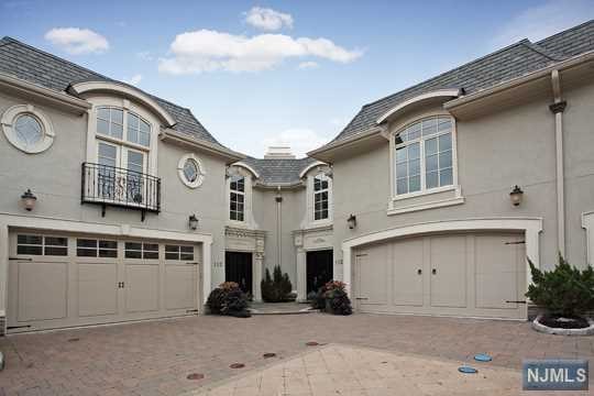 GORGEOUS 6,000 SF TOWNHOUSE LOCATED IN BELLAIRE, THE MOST DESIRABLE TOWNHOME COMMUNITY IN NORTHERN NEW JERSEY. THE STUNNING INTERIOR INCLUDES 3 BEDROOMS, 4 FULL & 2 HALF BATHS; AMAZING MOLDINGS & TRIM WORK THROUGHOUT; HIGH CEILINGS; ELEVATOR TO ALL LEVELS; DREAM GOURMET EAT-IN KITCHEN; 3 FIREPLACES; HIGHEST QUALITY WOOD FLOORING; DESIGNER HOME THEATRE, CCTV AND BAR THIS EXCEPTIONAL TOWNHOME OFFERS LUXURY LIVING AT ITS VERY BEST!