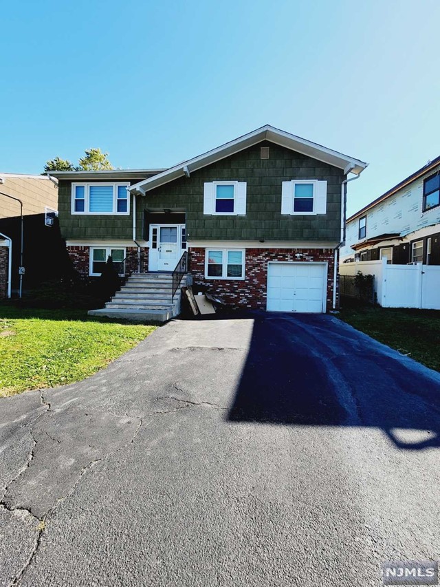 Updated 2nd floor for rent in bi-level home. Home has large living room open concept to dining room leading to updated kitchen. Three bedrooms, one full bathroom with beautiful hardwood floors throughout home. Bonus features include deck off dining room leading to large backyard, laundry on first floor plus 3 car parking in driveway.