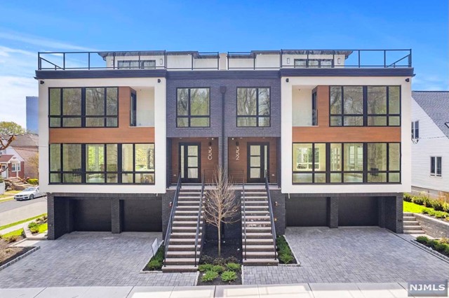 Designed & Built by SILVERLINE - Brand New Magnificent 4-Level 4750 SF Modern 'Park' Facing Townhome. Unique & Massive Open Concept Layout w/ Gigantic Pella Windows & Custom Milled Wide Plank European White Oak Flooring. Enormous-Size Chefs Kitchen Built w/ Modern European Custom Cabinets, Sleek Thin Profile Marble-Like Quartz, King-Size Kitchen Sink, Dedicated Fridge & Freezer, Wine Cooler, Overwhelmingly Large Kitchen Island, & Dedicated Separate Bar Sink. Third Level Boasts Enormous Master Bed w/ Private Juliet Balcony, M.Bath, 3 Oversized Beds, & 2 Full Baths. Retreat To The Spa Like M.Bath w/ Heated Floors, Large Freestanding Tub & Glass Rainfall Shower, Dual Vanities. 4th Level sits atop w/ Large Rec Room/ Office w/ Private Bar Leading To Stupendously Large Roof Deck w/ Unobstructed Breathtaking Views Of The Park. 4 Zone Heating & Cooling, True 2-Car Garage, C/Vac, Spray Foam Insulation. Smart Home Doorbell, Ultra Quiet Garage Door Opener, & Built-In Security Cameras