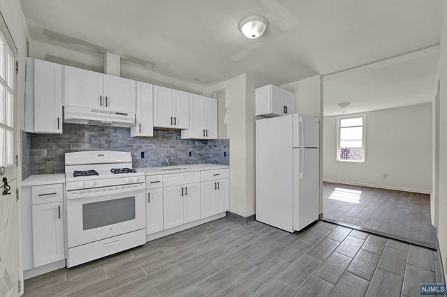 Lets welcome this lovely newly renovated 3 bed 1 bath 2nd FL apartment for rent to the market. Centrally located near major highways, local shopping, place of worship and schools. This unit has gone under extensive updates waiting for you to move right in. In unit laundry hook-ups, 1 off street parking and an oversized pantry are some of the few bonuses to live comfortably. NO PETS/NO SMOKING/ CREDIT CHECK/