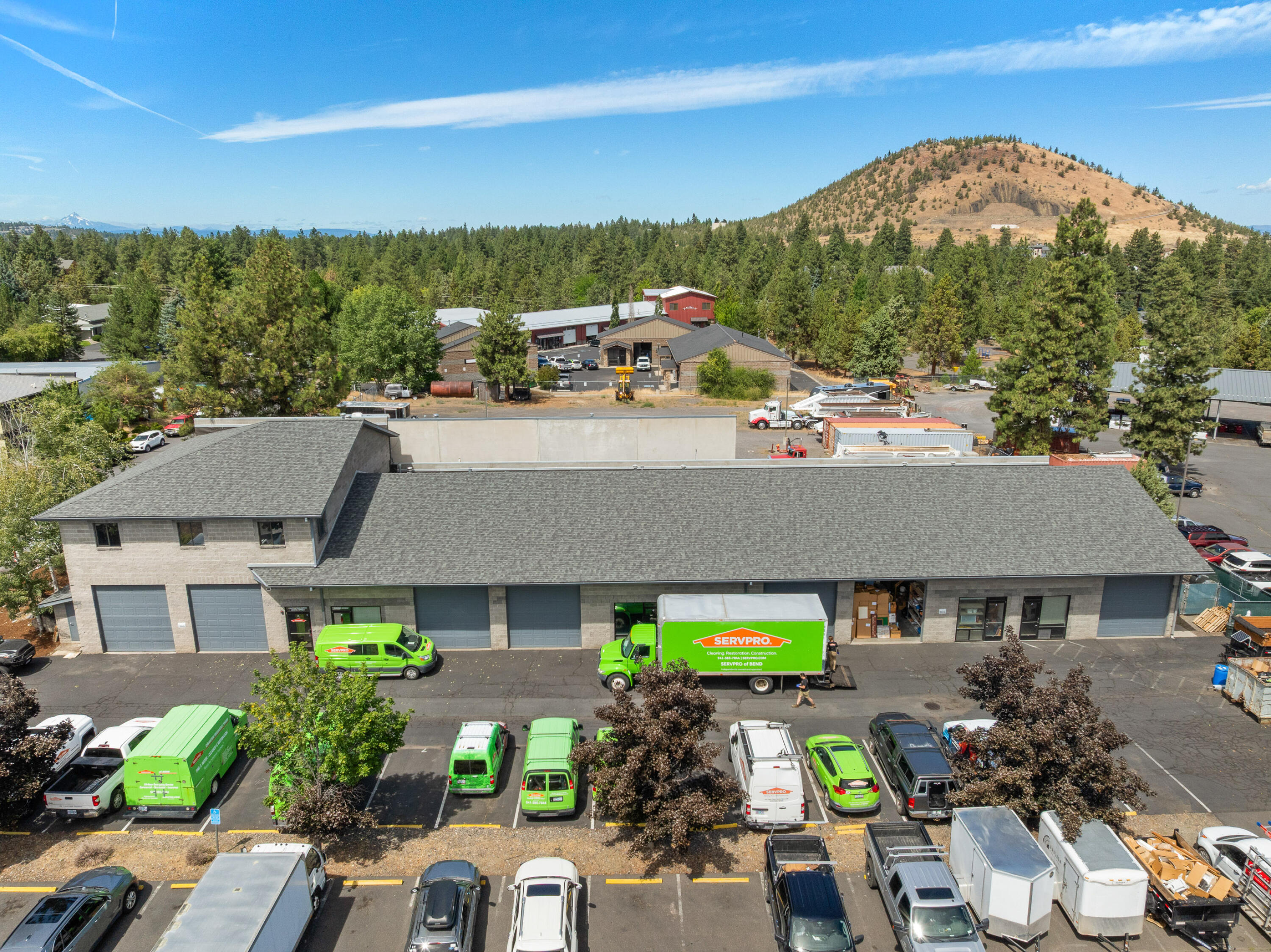 Investor opportunity. Fully occupied sale/leaseback. 5.8% cap rate with annual increases. Long term single tenant NNN lease with ServPro of Bend, a solid franchise locally owned and operated disaster restoration company.  Thriving business largely recession proof.
Well constructed and laid out masonry industrial building.  Ground floor features 6 heated bays with overhead doors, and bathrooms. All overhead gas heaters and thermostats replaced in 2023. Fully upgraded LED lighting throughout.
Approximately 2,000 sf of second floor office.
Complete new roof in 2023.  Good parking and access.  Small fenced storage yard.