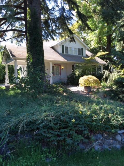 Fabulous home secluded in it's own park like setting! Garden area, six fruit trees; many decorative trees, water feature and screened in back porch all on .80 acres! Only a bike ride or walking distance to downtown Grants Pass. Beautiful two story home with a full basement. Home remodeled in 2003 and more improvements in 2006. Top of the line appliances in the kitchen. A warm and inviting sunroom that overlooks the large plush front yard. There is a bonus play house and a separate guest house. District 7 schools. This home has so much to offer!
