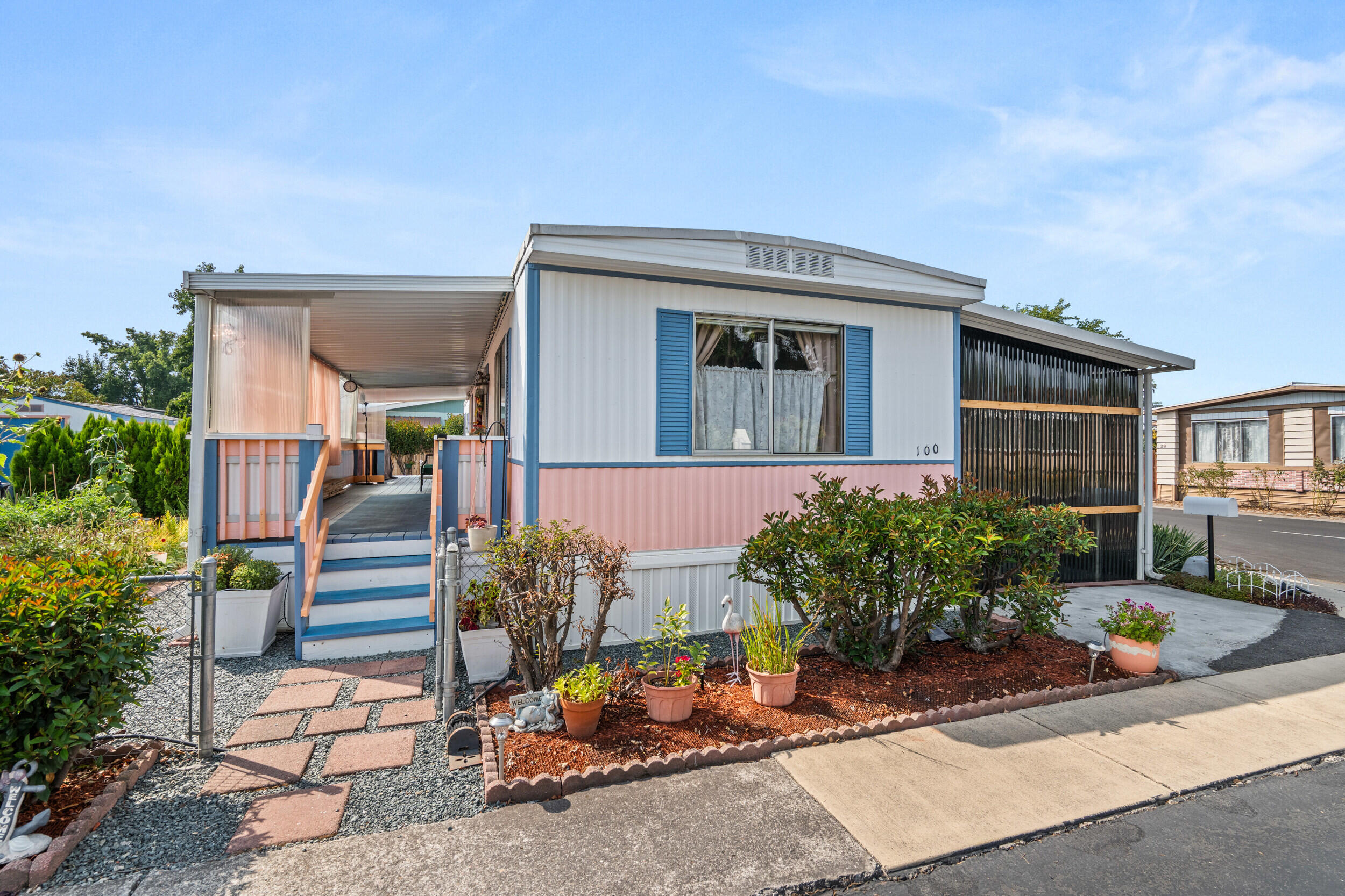This home has so many updates and offers you community like no other! This split floorplan offers you a master suite on one end and either a second bedroom or cozy den on the other side of the home. This home has been lovingly renovated in 2017- 2019, but truly the renovations haven't stopped. New furnace, insulation, electrical, plumbing, lighting, interior and exterior paint, laminate plank flooring, a full front bath, and full kitchen remodel. The enclosed carport is nearly as equivalent as a single car garage, ample parking and plenty of shop and storage space! RV electrical and water hookups, trailer/ small boat parking too. Enjoy your beautiful yard with lush grass, gated garden with raised beds, and a small ''she shed'' for enjoyment or storage. Space rent is $666 monthly and includes a pool, gym, clubhouse, potlucks, trash and sewer. Situated well in the park and in the quaint town of Central Point, you have medical, restaurant, shopping, and airport access.