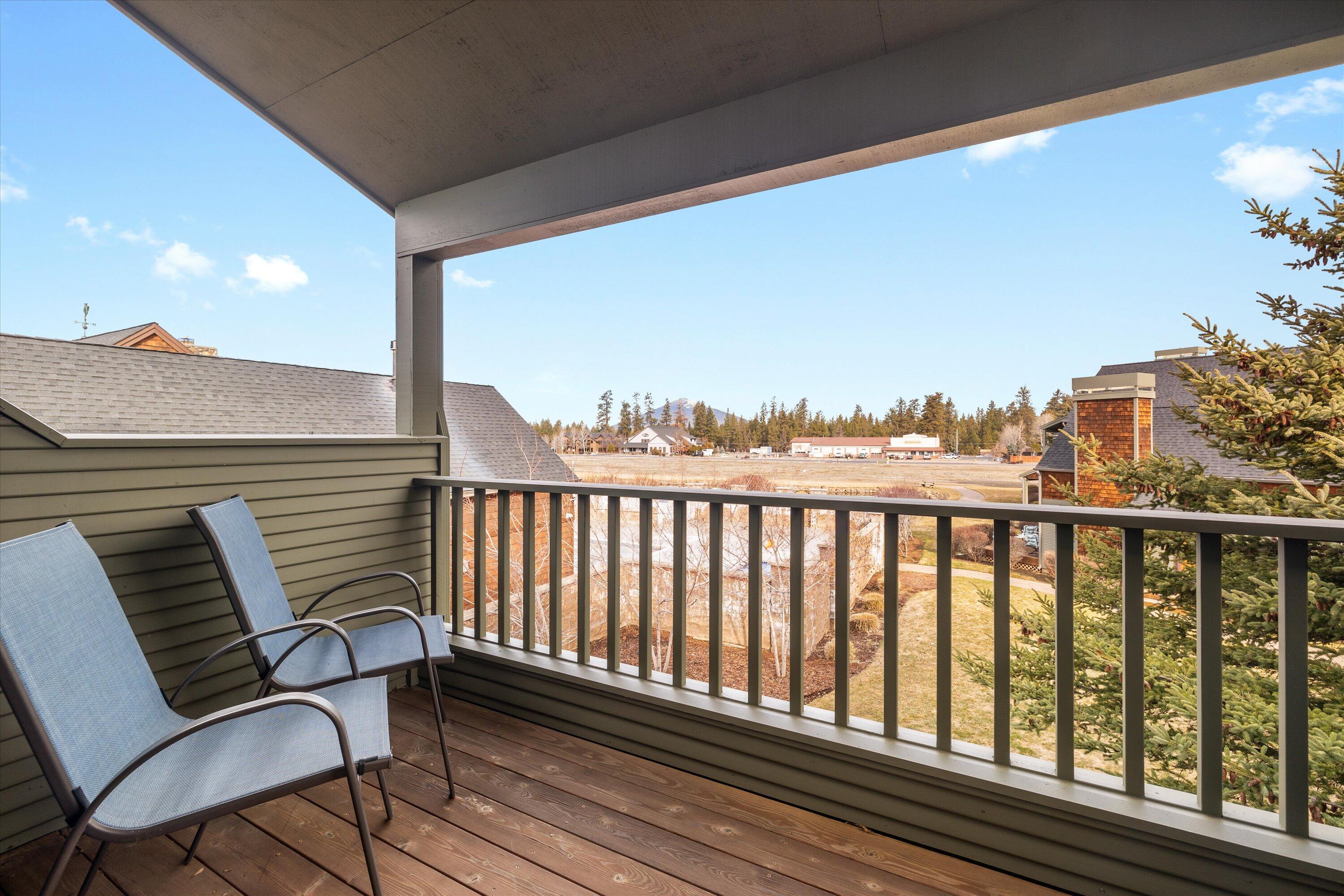 Welcome to easy Central Oregon living in this beautifully maintained 2-bed, 2-bath upstairs end unit in the sought-after Pine Meadow Village in Sisters. With 2 private decks, you'll enjoy peaceful mornings with coffee and relaxing evenings with a glass of wine, all while taking in the serene surroundings. Inside you'll find a primary suite, central A/C and a gas fireplace for year-round comfort, and an open-concept living space filled with natural light. Located just a short walk from the boutiques, restaurants, and festivals of downtown Sisters, the neighborhood offers top-notch amenities including a pool, hot tub, tennis courts, scenic walking trails, and a clubhouse that hosts regular community gatherings. This home also includes a detached one car garage with storage, plus two deeded parking spaces. Currently operating as a successful short-term rental, this property would also make a great second home or full-time residence in one of Central Oregon's most desirable communities.