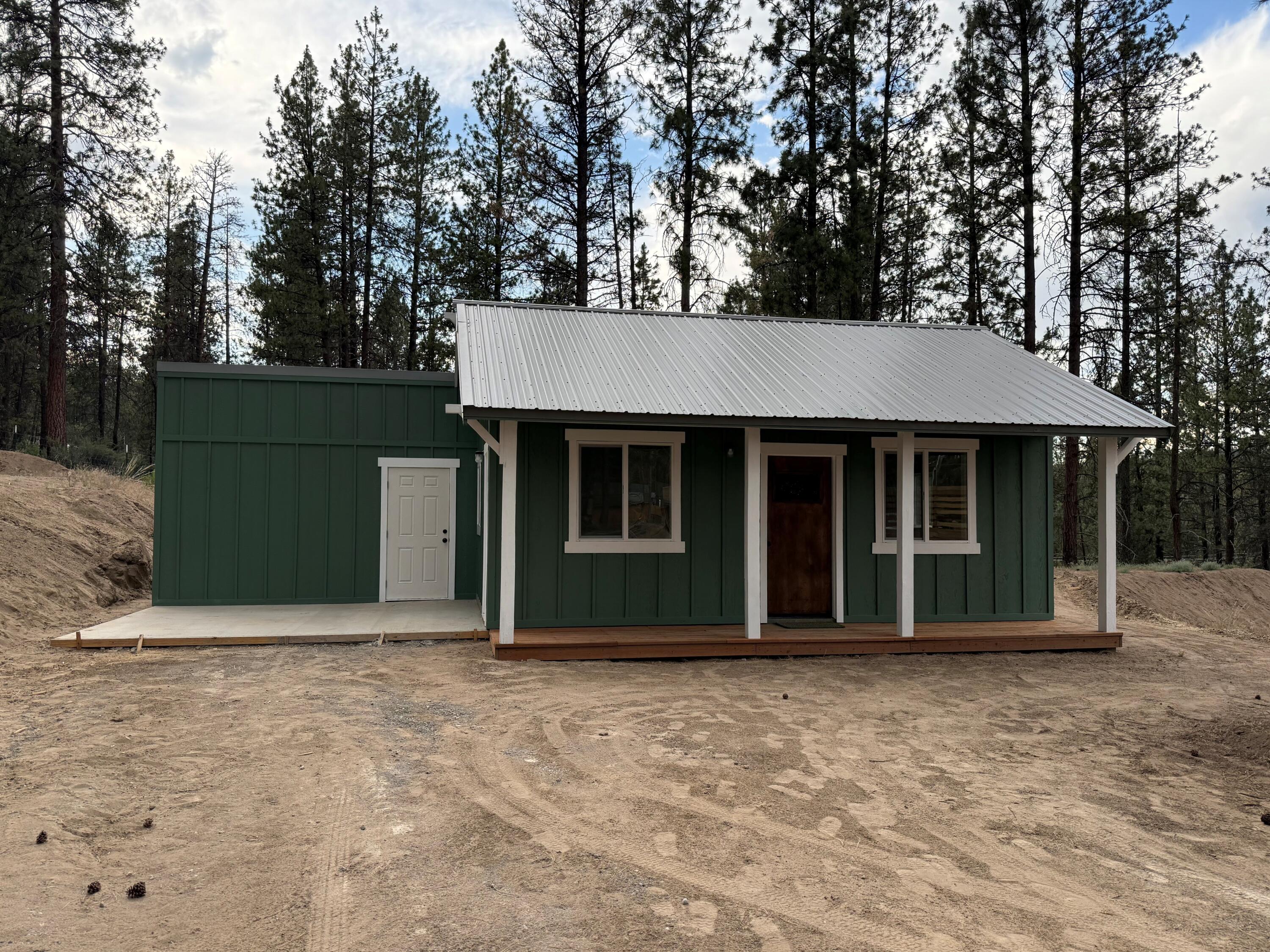 Buyer motivated! Bring ALL offers! Brand new 1 bedroom 1 bath home on 3 acres close to Bonanza. Home has new septic system, well and power. Plenty of room to build a shop or barn for animals or all your toys. Property is completely fenced, cross fenced with a gate and has also been set up for an additional home site. Attached pump house is insulated and sheet rocked.