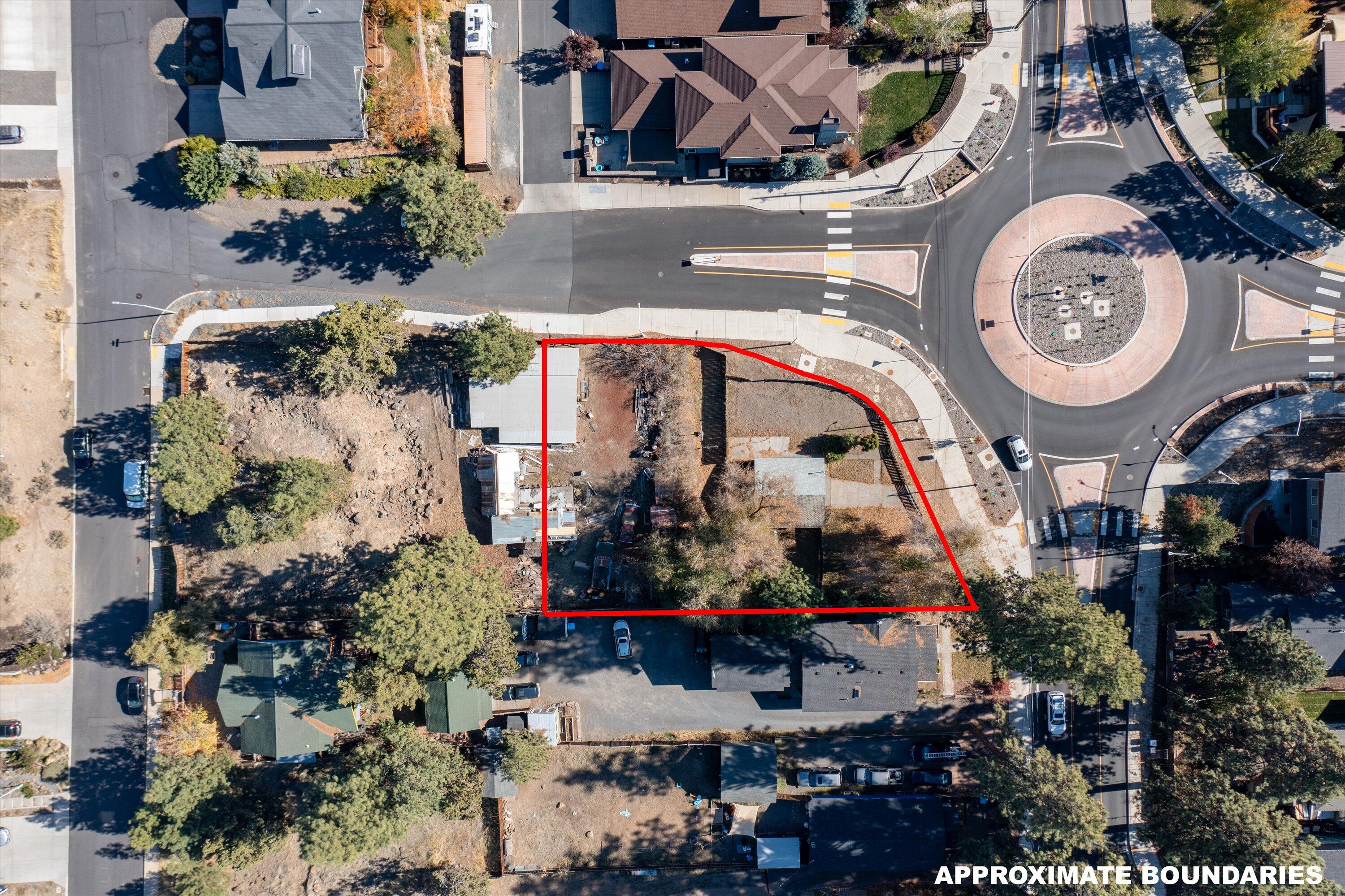 Location. Location. Location. Discover a rare gem in the heart of Bend. A prime development opportunity offering .31 of an acre. Unbeatable access to a wide array of amenities including Newport Market. Property is currently fully fenced and as an existing garage and driveway.