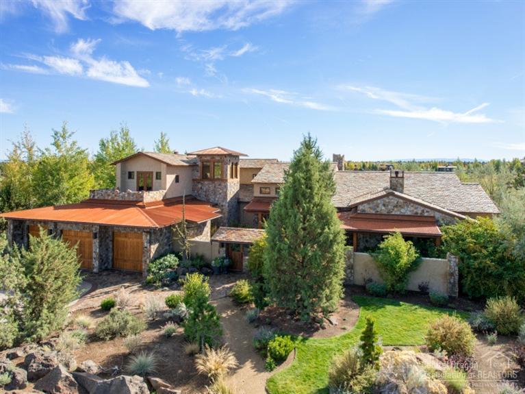 Custom Tuscan retreat on South facing lot backing the driving range at Pronghorn. The finest finishes & materials went into the construction of this home including English oak, Texas mesquite Cowboy hickory, Israeli limestone, Venetian plaster, Telluride gold stone & wrought iron. Remarkable kitchen w/ top of the line appliances, marble countertops & fully equipped pantry, wine cellar, private casita w/ separate entrance and an amazing outdoor living space w/ a wood burning fireplace & radiant heat floor.