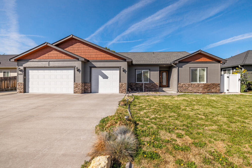 Agent Remarks: Home was built in 2006 by Tom Soyland. Tom Soyland homes offer exceptional value with quality throughout the home. The home is fully landscaped both front and back with inground timed sprinklers. Large deck in back yard and a tuff shed for storage with behind the gate parking. The home has an oversized garage with 3 car capacity. RV allowed with concrete parking space on the side of the garage. Interior flooring has bamboo wood, tile and carpeting. Custom Plantation Wood Shutters will stay with the new owner. This model has been used as a 3 bedroom but has a flex room that could be used as a 4th bedroom, currently configured as an office. Open floorplan with gas fireplace. The quality of this home is obvious, come take a look.