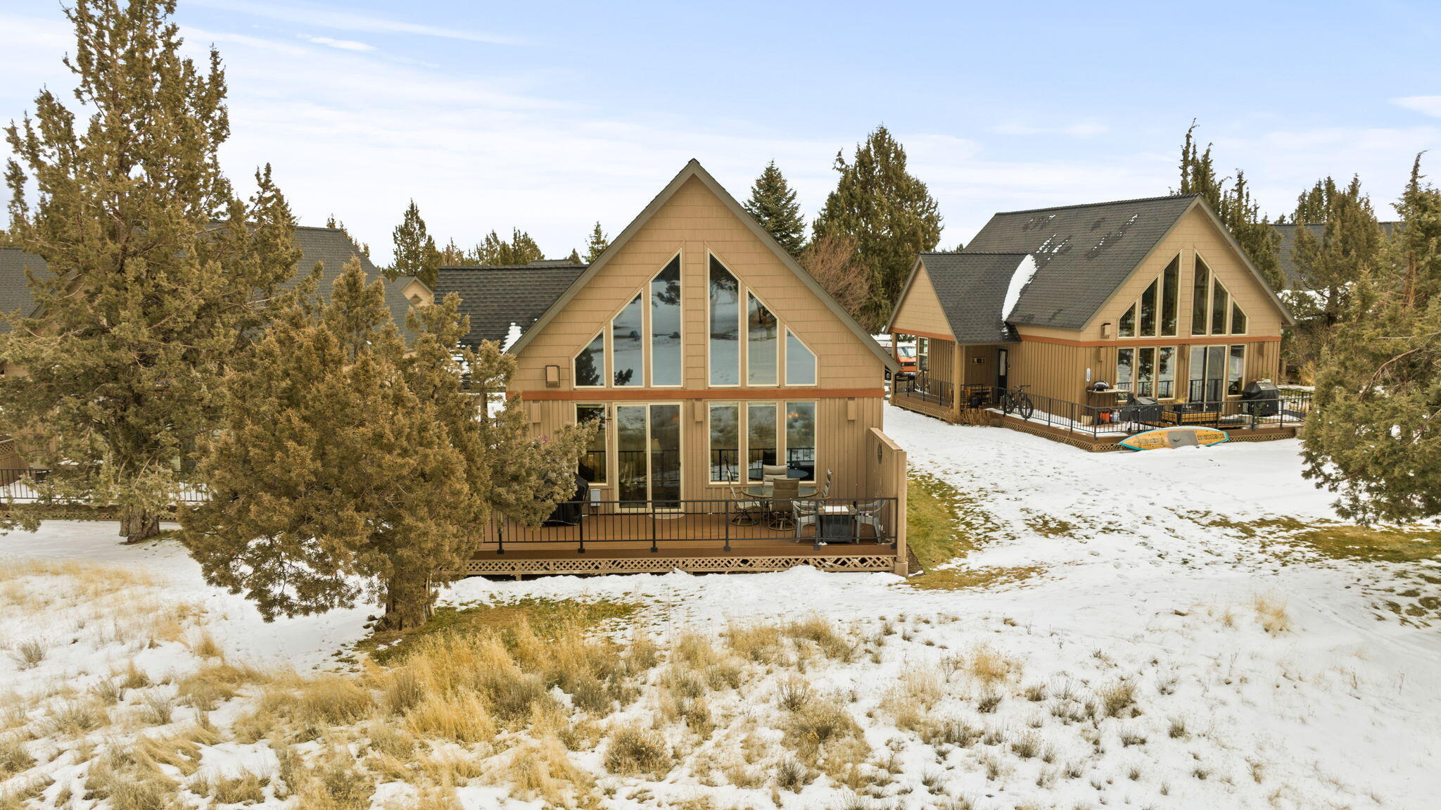 MOTIVATED SELLER MAKE OFFER - Chalet located at The Ridge at Eagle Crest Resort & Golf with 1,700 acres. Take a close look at the unique placement of this home jetting out past the other nearby chalets offering additional privacy on the 18th Fairway. Fully furnished to rent. Unique opportunity to also have a two car garage for additional storage & parking! HOA recently replaced trex decking, railing, and slated for exterior painting and roof replacement. Gorgeous and vast views from the inside looking towards Cline Butte. 3-Bed, 2-Bath, propane fireplace with rock accents, soaring high vaulted ceilings with knotty pine, ample natural light from large picturesque windows, beautiful log beams add to the architecture and compliment the natural landscaping. Resort's amenities: three -18 hole golf courses, restaurants, pools, a spa and athletic clubs, as well as hiking and biking trails, clubhouse; Park; Tennis Court(s), RV/Boat Storage. HOA allows short-term rentals (Airbnb & VRBO)!