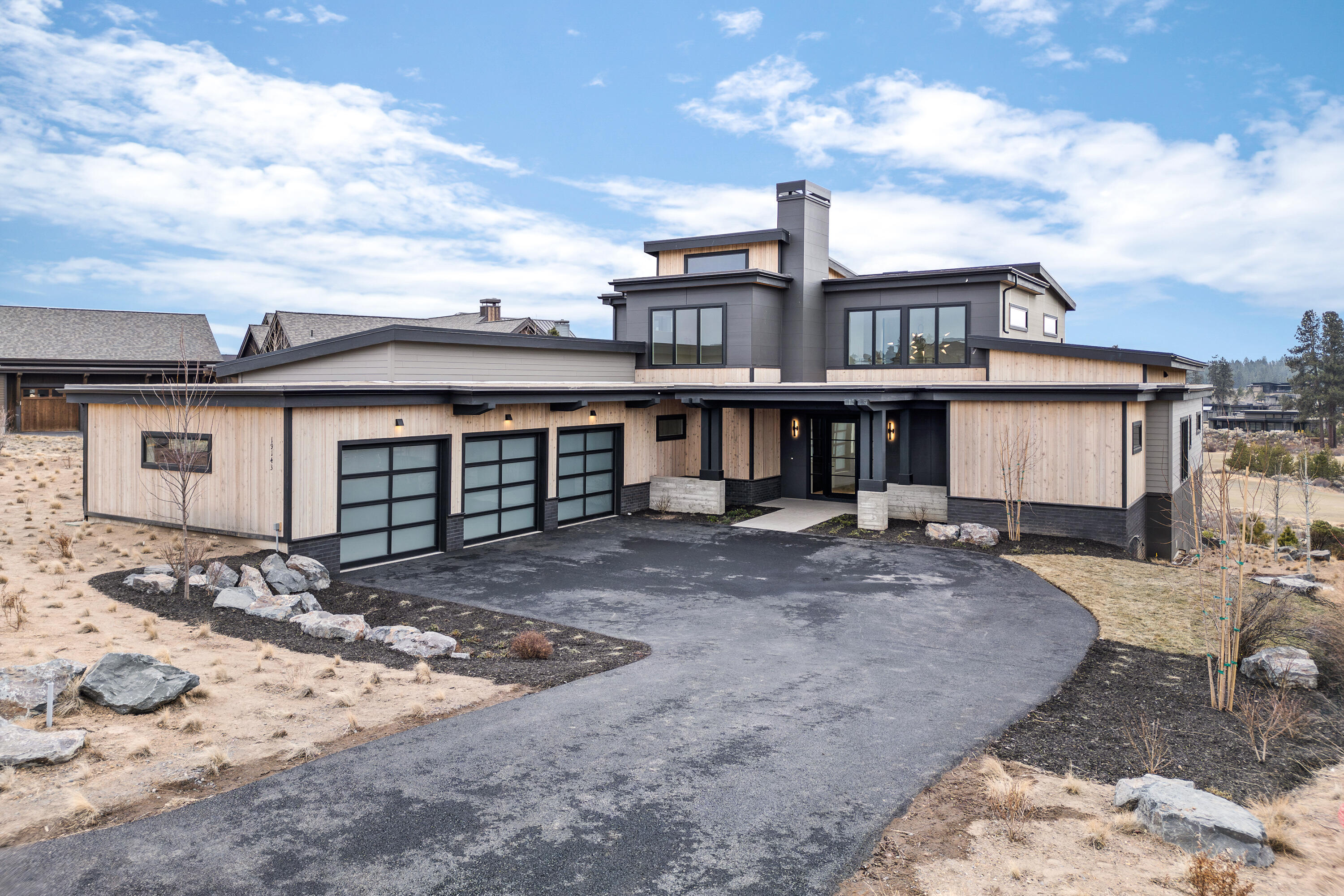 Brand new custom home in Tartan Druim is now finished and move in ready! With killer Tetherow Golf Course views, the home is situated on over a half of an acre toward the end of the cul de sac above the 5th fairway.  Featuring an open great room floor plan with vaulted ceilings and tongue & groove accents, two spacious en-suites and office on the main level, and two bedrooms with a bonus room upstairs. The chef's kitchen features sleek cabinetry, oversized gas range, large kitchen island, and luxury appliances including two dishwashers. The primary bedroom suite includes ample storage, his and hers vanities, soaking tub, walk in shower and oversized closet. Amenities include solid surfaces, designer tile, wrap around deck, A/C, radiant primary bath floors and 3 car garage. The neighborhood park, Tartan Place, features 3 acres of grass, bocce ball courts, firepit, restrooms and grill. The resort community of Tetherow features 2 swimming pools, fitness classes, restaurants, golf & more.