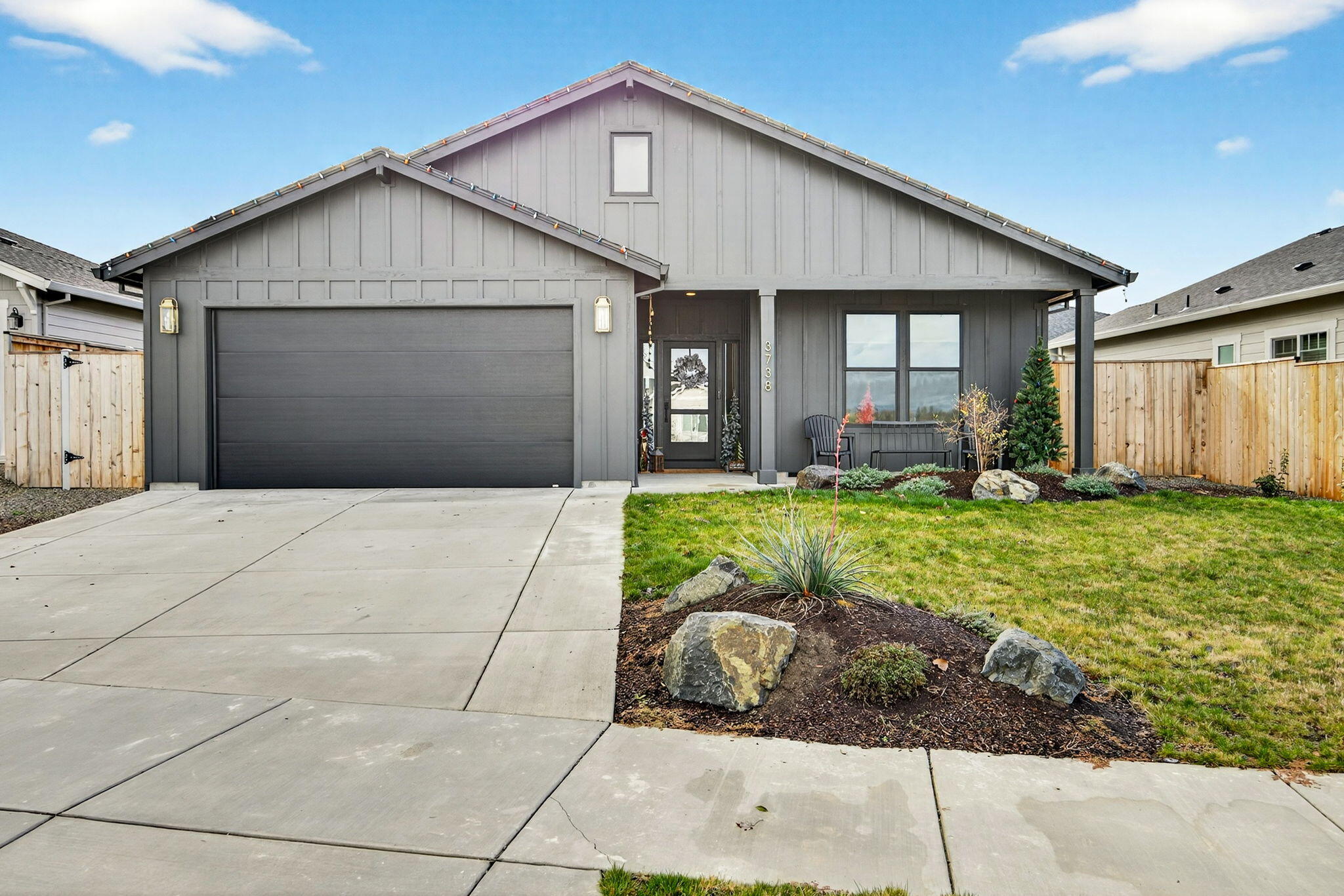 Welcome home to this inviting 2023 quality build by Mahar Building and Developing, LLC! This modern 3-bed, 2-bath home offers 1,554 sq ft of warm, thoughtfully designed living space filled with natural light. The entertainer's kitchen features a large island, soft-close custom cabinetry, and a generous pantry. Enjoy a cozy living room with a gas fireplace, recessed lighting, and a ceiling fan. The primary suite includes dual vanities and a spacious walk-in closet. Guest bedrooms are comfortably sized with excellent storage. The fully finished garage and landscaped front and back yards with sprinklers lend to easy maintenance. The covered patio and south-facing backyard are perfect for gardening or relaxing. Centrally located in a highly desired neighborhood close to schools, shopping, and medical services.