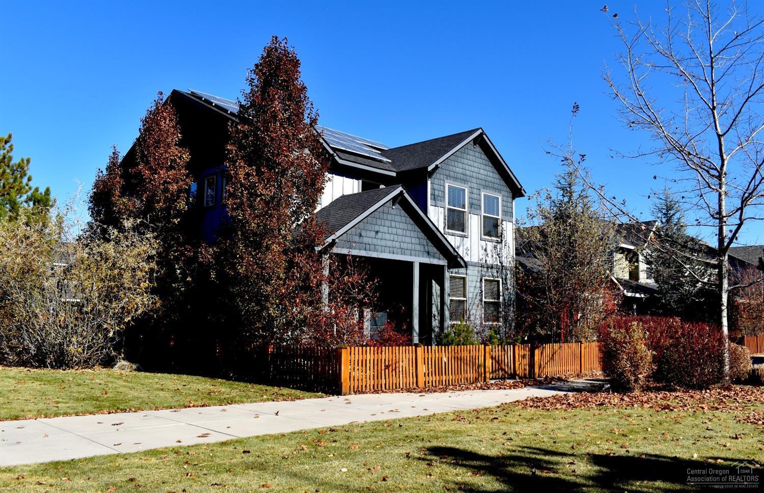 Don't miss out on this large craftsman in the Gardenside community of Bend! You'll enjoy the extra space of a corner lot that sits directly across from Gardenside park and surrounded by beautifully maintained community space. The home itself is one of the few in the neighborhood featuring rooftop solar panels allowing you to take advantage of low-cost green energy. Inside you'll enjoy lots of living space, a downstairs master, and tons of natural light. This opportunity won't last long!