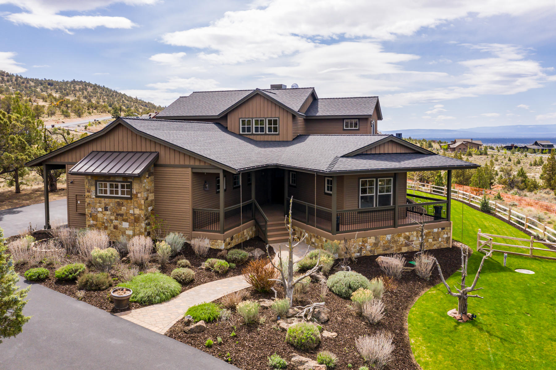 Sweeping panoramic Cascade Mountain views, timeless finishes and a Guest Casita all welcome you home to this Brasada Ranch beauty! Large, spacious fully landscaped lot with expansive deck that orients towards the mountains does not disappoint. Enjoy a light and bright home with distressed wood floors, vaulted ceilings, stone accents, a gourmet kitchen complete with a double oven and cooktop, a downstairs master bedroom with fireplace and spacious office area that opens to the deck! Luxury accommodations for guests in the separate Casita, complete with a kitchenette and a gas fireplace. Enjoy all the benefits of year-round resort living at Brasada Ranch, including an Athletic Center with multiple pools, Water Slide and Lazy River, Equestrian Center, Golf Course, Spa, Restaurants, Hiking, Biking, Horseback Riding, the amenities are endless!